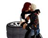 kiss on pile of tires