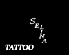 Selina arm name tattoo