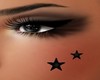 black stars face tattoo