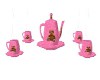 Pink teapot with bear