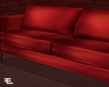 Red cushioned sofa