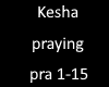 Kesha praying