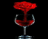 pouring a red rose