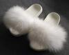 White furry slides