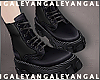 A) Black boots
