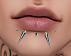 b. lip piercing spikes