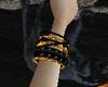 gold and black bracelets