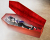 Couples cuddle coffin