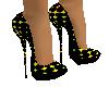 black and yellow pumps