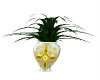 gold vase with plant