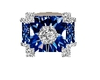 His custom sapphire ring