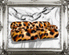 𝕽. leopard couch