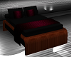 Dark wood bed