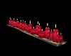 ROW OF RED CANDLES