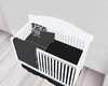 black oblique baby crib