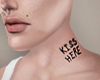 Kiss here, neck tattoo.