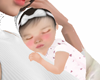 Mariah baby in chest 2
