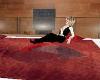 Red silk rug wth pillows