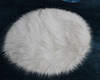 White fur oval rug