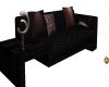 Black couch with pillows