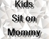 Kids Sit On Mommy