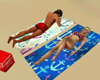 couples tanning towel