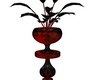 red/black.plant,in,vase