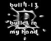 bullet in hand