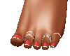 Red toe nails and rings