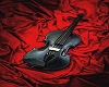 Red sheets black violin
